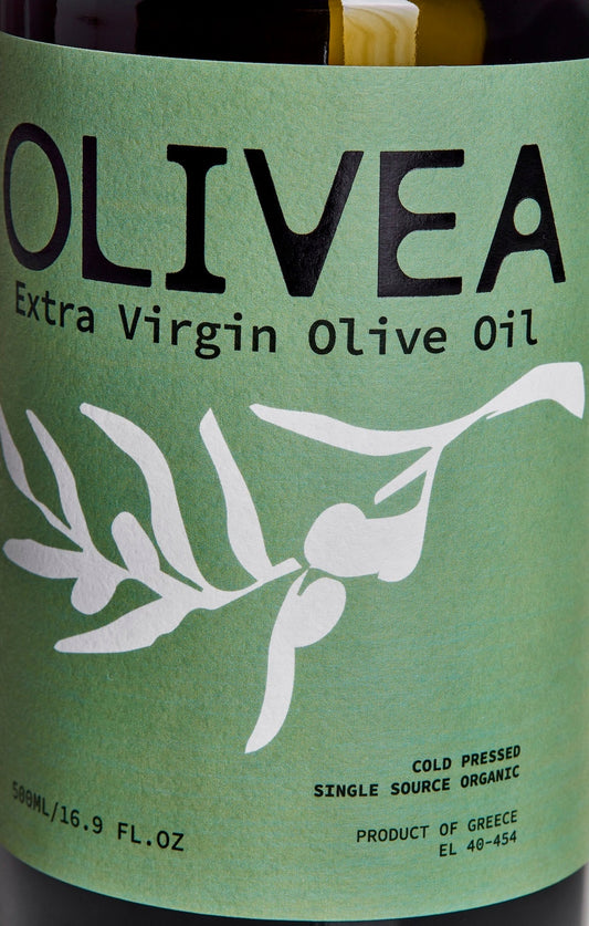Olive oil bottle label with 'OLIVEA' branding and olive design on a green background