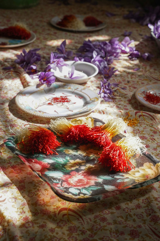 Saffron threads displayed with crocus flowers.