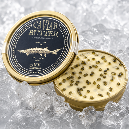Caviar butter in a gold container with a black lid on a textured gray background