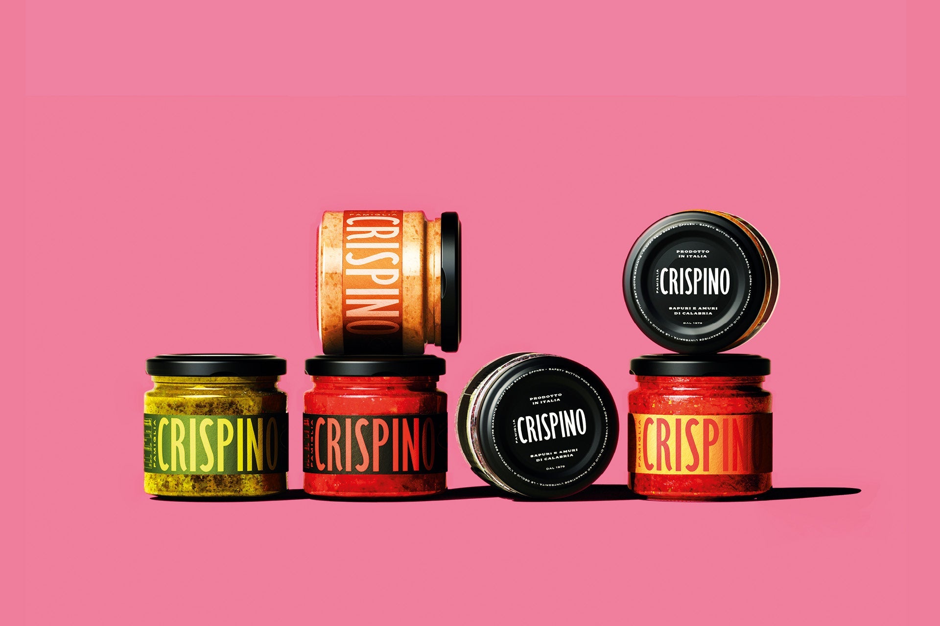 Jars of Crispino on a pink background