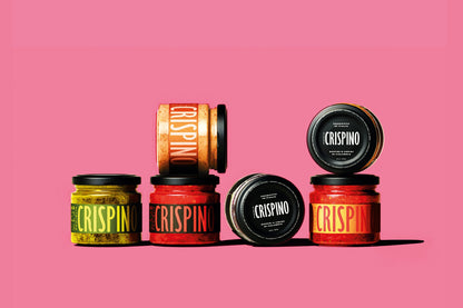Jars of Crispino on a pink background
