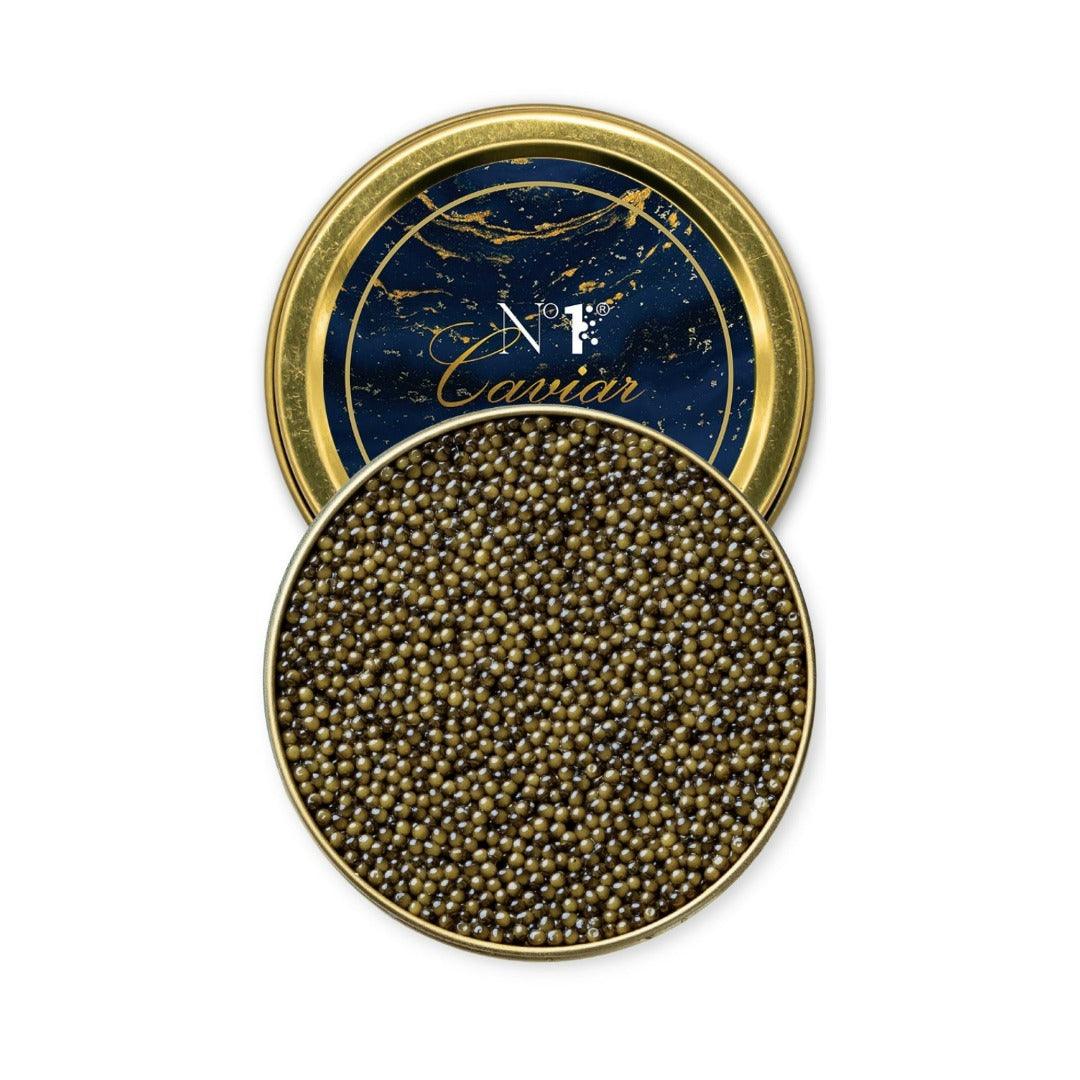 Open container of caviar with a decorative lid on a white background