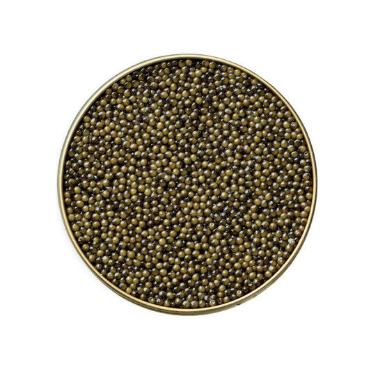Round dish filled with caviar on a white background
