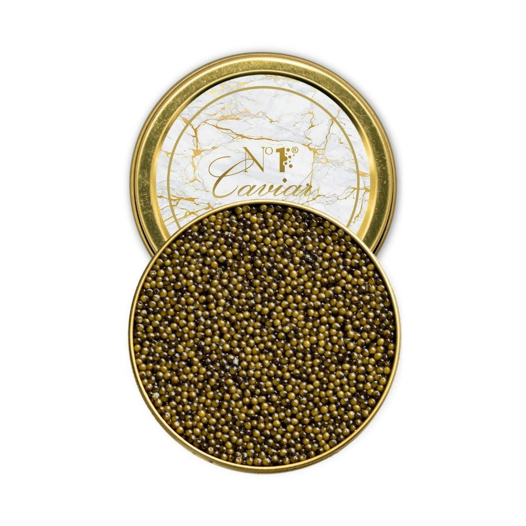 Open container of caviar with a decorative lid on a white background
