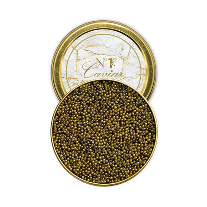Open container of caviar with a decorative lid on a white background