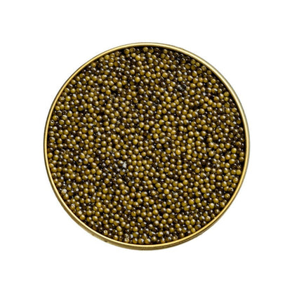 Round dish filled with caviar on a white background