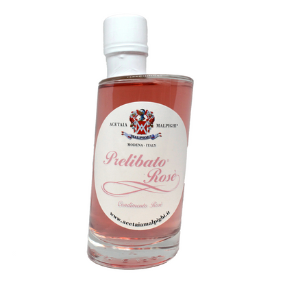 Bottle of 'Prelibato Rosé' with a white label on a white background