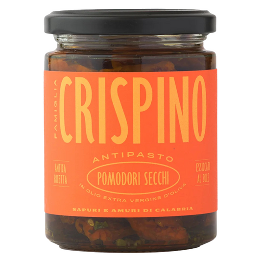 Jar of Crispino antipasto with an orange label on a white background